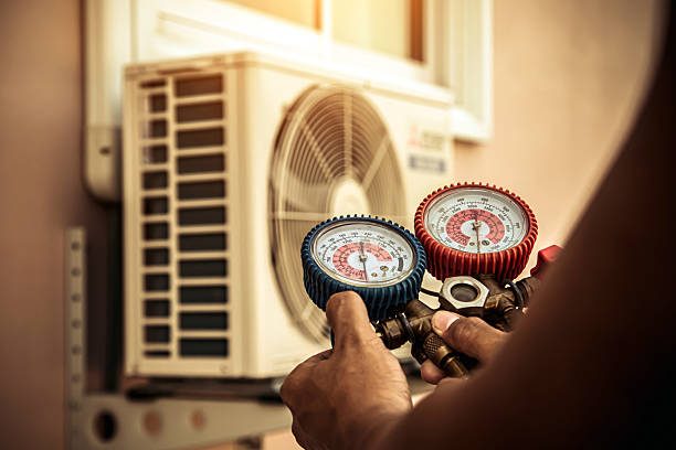 Professional Hvac technician working in Pisgah Forest, NC